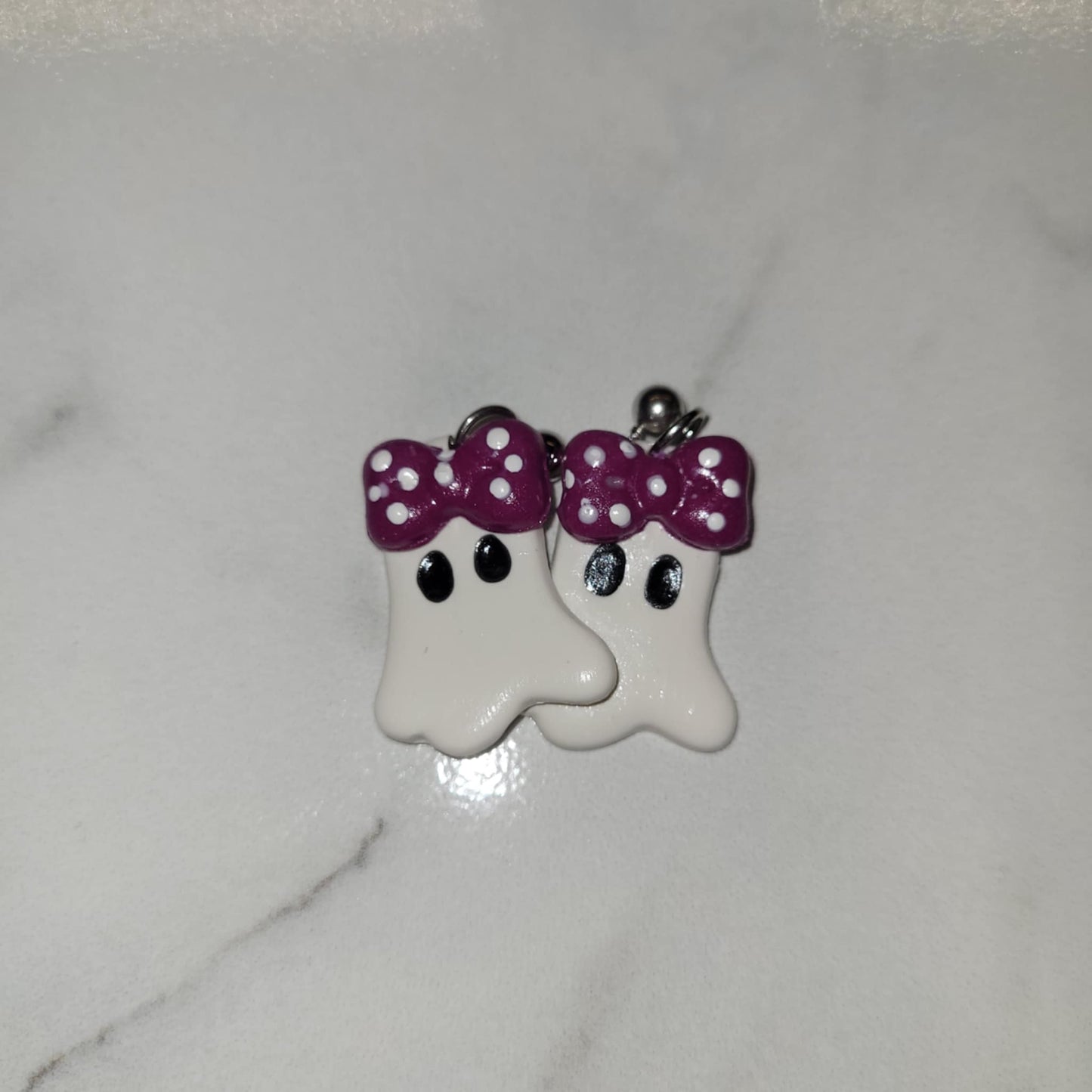 Purple Bow w/ polka dots